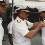 Navy Officer awarding pin
